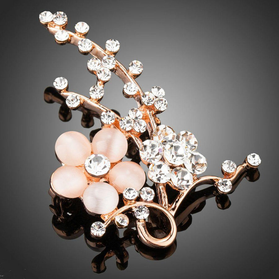 Khaista cat's eye stone flower brooch on white background