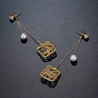 chain square pearl drop earrings detail view by KHAISTA
