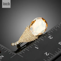 Close-up of champagne crystals on Khaista design brooch