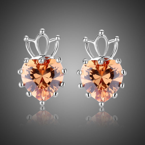 KHAISTA champagne cubic zirconia earrings on white background