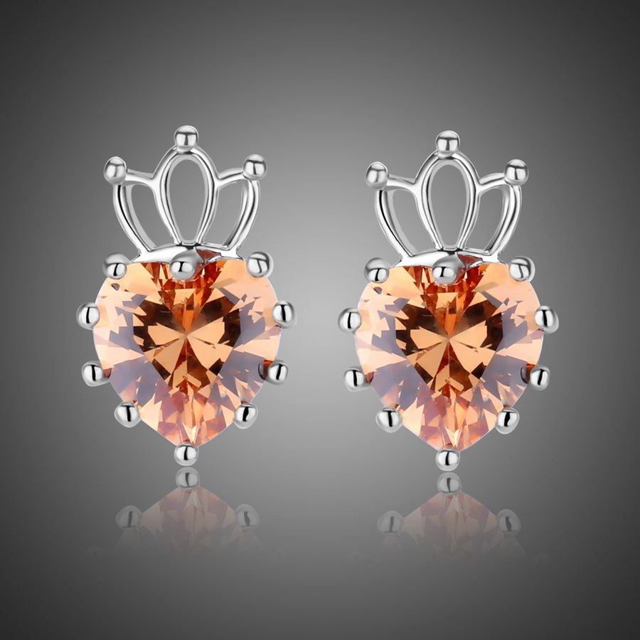 KHAISTA champagne cubic zirconia earrings on white background