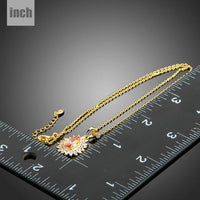 Pendant detail on KHAISTA champagne CZ sunflower pendant necklace