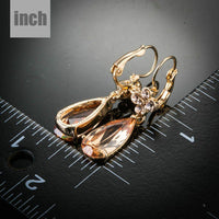 champagne flower CZ hanging earrings detail view by KHAISTA