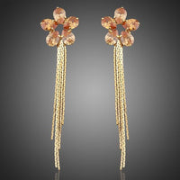 KHAISTA champagne sunflower crystal drop earrings on white background