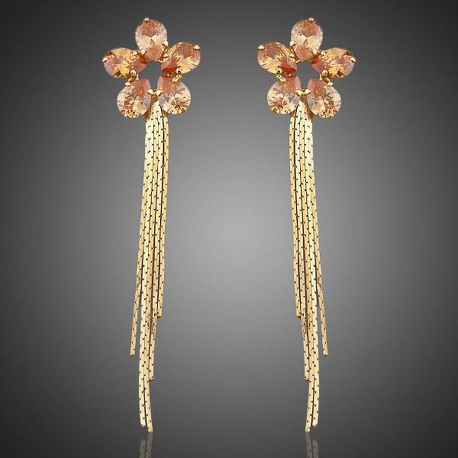 KHAISTA champagne sunflower crystal drop earrings on white background