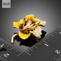 Close-up of champagne zircon on Khaista oil paint brooch