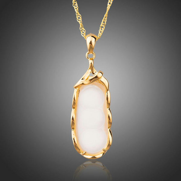 KHAISTA classic gold chain necklace on white background