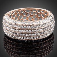 KHAISTA classic rose gold cuff bangle on white background