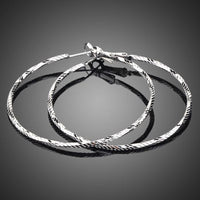 KHAISTA classic round crystal hoop earrings on white background