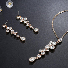 Load image into Gallery viewer, Clear Austrian Crystals Long Drop Earrings and Necklace Set - KHAISTA Fashion Jewellery
