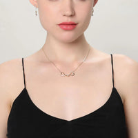 Side angle view of Khaista infinity CZ set