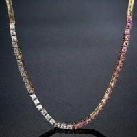 Close up detail of KHAISTA clear CZ long pendant necklace