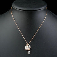 Close up detail of KHAISTA clear CZ pendant necklace