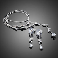 Side angle view of Khaista clear CZ floral set