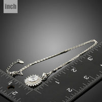 Pendant detail on KHAISTA clear CZ sunflower necklace