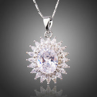 KHAISTA clear CZ sunflower necklace on white background
