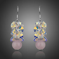 KHAISTA cluster gradient bunch crystal drop earrings on white background