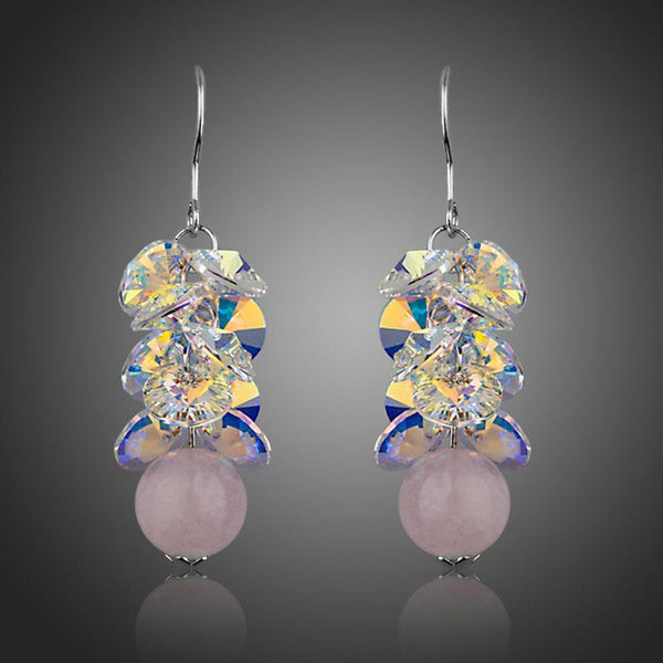 KHAISTA cluster gradient bunch crystal drop earrings on white background