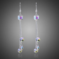 KHAISTA colour change raindrop dangle earrings on white background