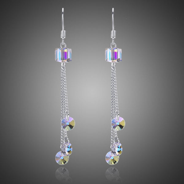 KHAISTA colour change raindrop dangle earrings on white background