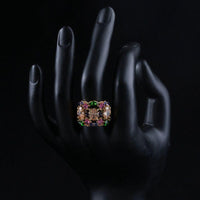Side angle view highlighting the comfortable band silhouette of the luxury multicolor crystal cocktail ring