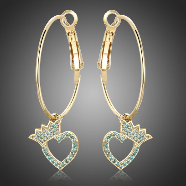 KHAISTA crown heart crystal dangle earrings on white background