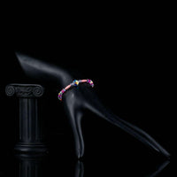 Side angle view of KHAISTA crystal beads lobster bracelet