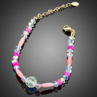 Close up detail of KHAISTA crystal beads lobster bracelet
