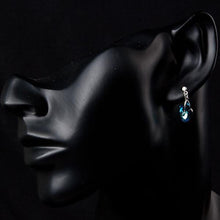 Load image into Gallery viewer, Crystal Dark Blue Heart Drop Earrings - KHAISTA Fashion Jewellery

