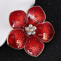 Close-up of crystals on Khaista flower brooch