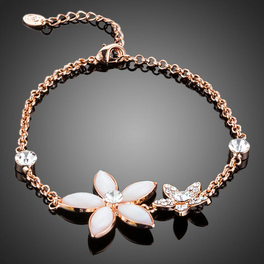 KHAISTA crystal flower link chain bracelet on white background