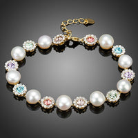 KHAISTA crystal flower stud pearl bracelet on white background