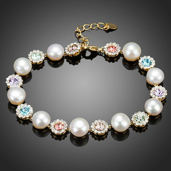 KHAISTA crystal flower stud pearl bracelet on white background