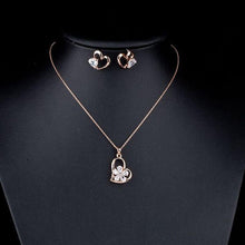 Load image into Gallery viewer, Crystal Heart Shaped Stud Earrings and Necklace Set - KHAISTA Fashion Jewellery
