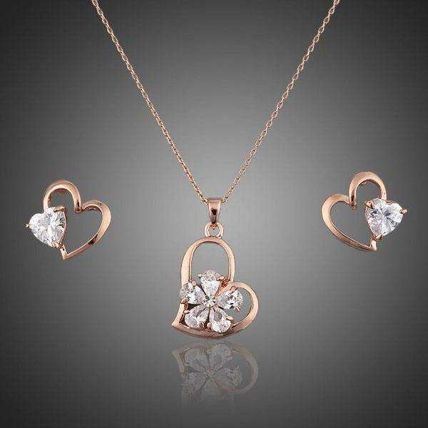 Khaista crystal heart stud earrings necklace set on white background