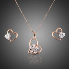 Load image into Gallery viewer, Crystal Heart Shaped Stud Earrings and Necklace Set - KHAISTA Fashion Jewellery
