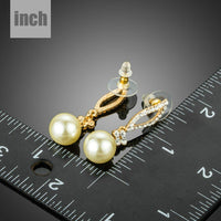 crystal leaf pearl drop earrings detail view by KHAISTA