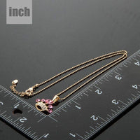 Pendant detail on KHAISTA pink crystal crown pendant necklace