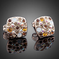 Close up of KHAISTA crystal stars stud earrings