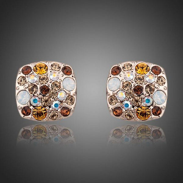 KHAISTA crystal stars stud earrings on white background