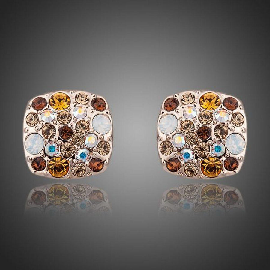 KHAISTA crystal stars stud earrings on white background