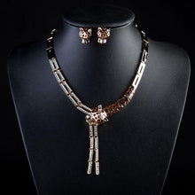 Load image into Gallery viewer, Crystal Stellux Austrian Leopard Stud Earring and Necklace Set - KHAISTA Fashion Jewellery

