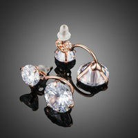Close up of KHAISTA white CZ crystal drop earrings