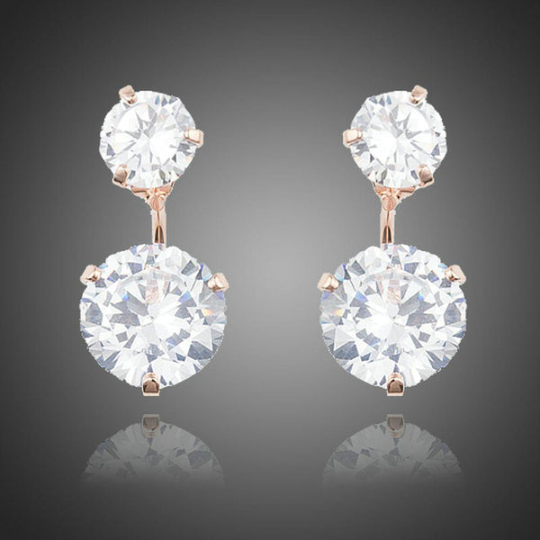 KHAISTA white CZ crystal drop earrings on white background