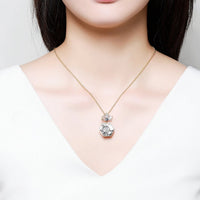Side angle view of KHAISTA crystal pendant necklace for women