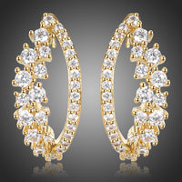 KHAISTA cubic zircon fashion earrings on white background