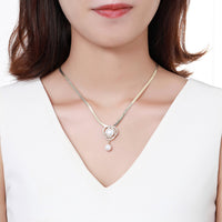 Pendant detail on KHAISTA cubic zircon pearl flower necklace