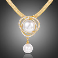 Close up detail of KHAISTA cubic zircon pearl flower necklace