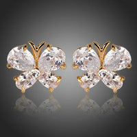 KHAISTA CZ butterfly stud earrings on white background