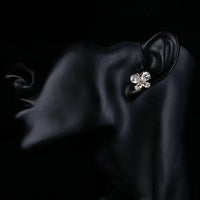Close up of KHAISTA CZ butterfly stud earrings